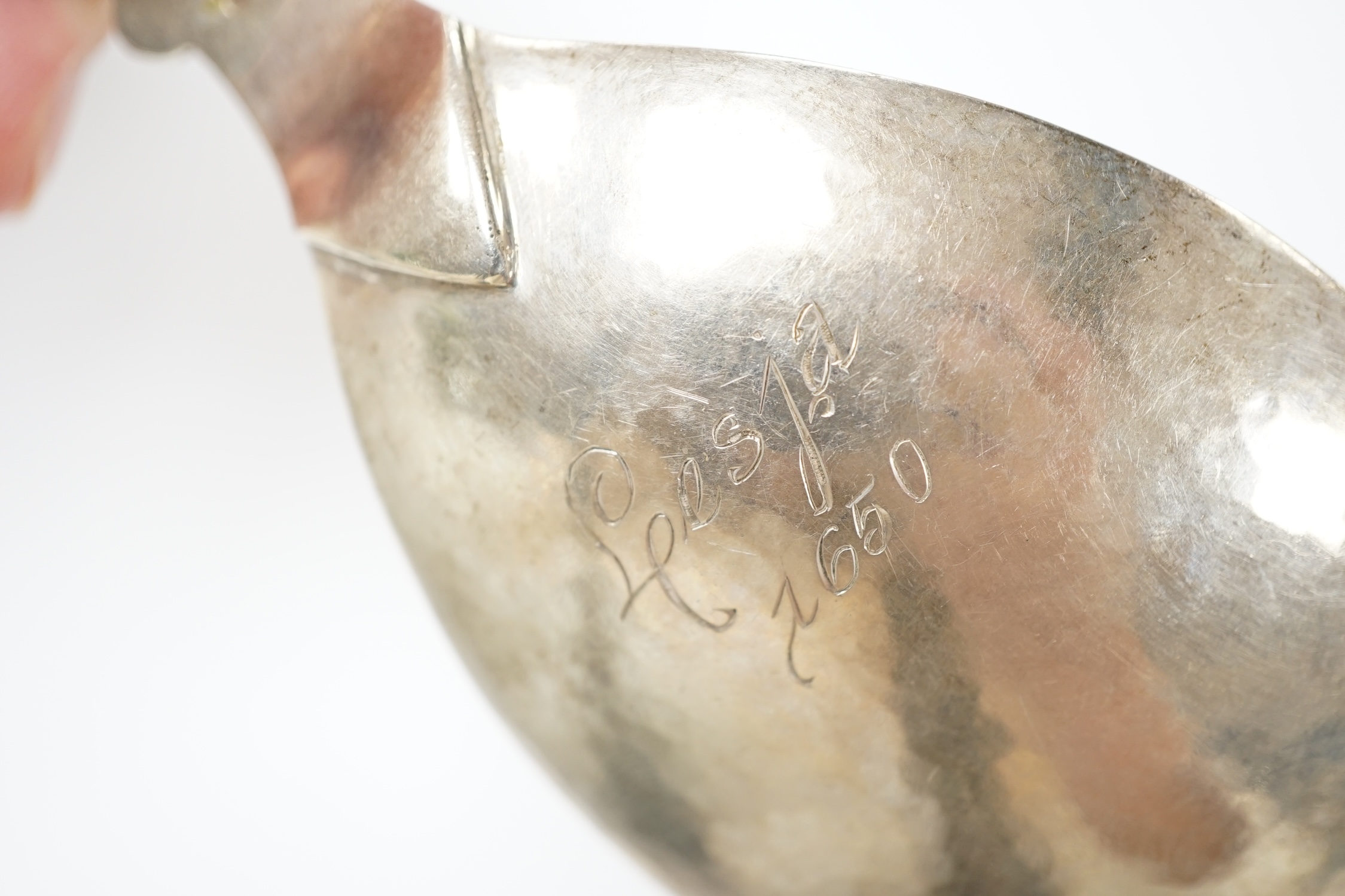 Five assorted early to mid 20th century Danish 830S spoons, largest 21.1cm, together with an Elizabeth II silver two handled presentation trophy cup with engraved inscription relating to the 'Tanganyika Coffee Growers As